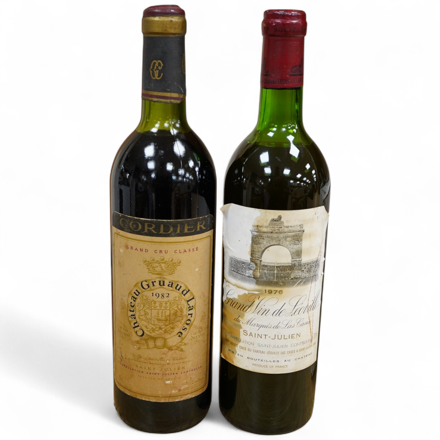 A bottle of Grand Vin de Léoville du Marquis de Las Cases Saint-Julien, 1976 and a bottle of Cordier Chateau Gruaud LaRose Saint-Julien 1982